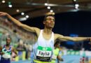Abdisa Fayisa celebrates his 3000m win at the World Indoor in Germany