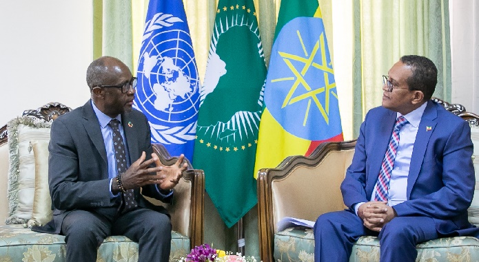UNDP Ethiopia's new resident representative Samuel Gbaydee Doe (Left) presented copies of his Credentials to Melaku Bedada, Protocol Affairs Director General at the Foreign Ministry on Wednesday.