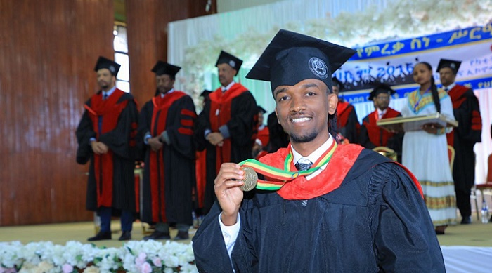 Dr Michael Zenebe Nigussie take the gold medal after graduating with highest GPA